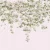 Soft pink 'Clematis Collection' wallpaper featuring a cascade of delicate white blooms, evoking a serene and romantic atmosphere in any room.