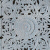 Close-up of the Distressed Blue Queen Headboard with elegant floral carvings, offering a rustic yet sophisticated allure to the bedroom space.
