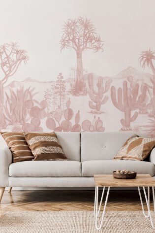Wallpaper with a 'Desert Pink' theme, showcasing a variety of cacti and desert trees in soft hues, complementing the minimalist and natural decor of the room.