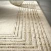 Handmade cream and beige geometric rug from the Signature Collection, made from 100% New Zealand wool, with geometrical line patterns.