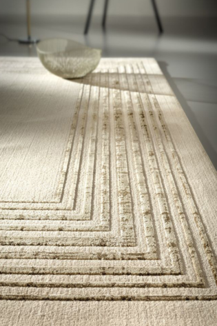 Handmade cream and beige geometric rug from the Signature Collection, made from 100% New Zealand wool, with geometrical line patterns.